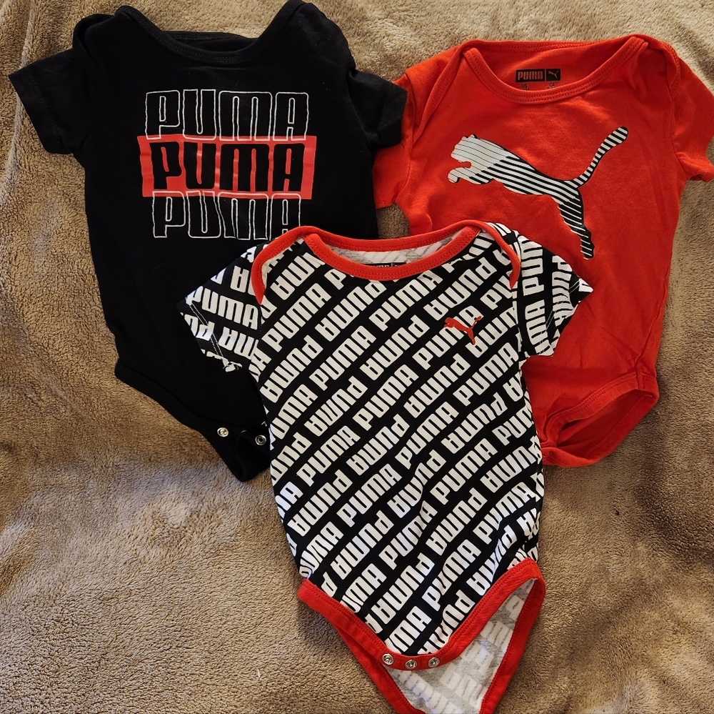 Three PUMA size 6 to 9 month onesies. New!